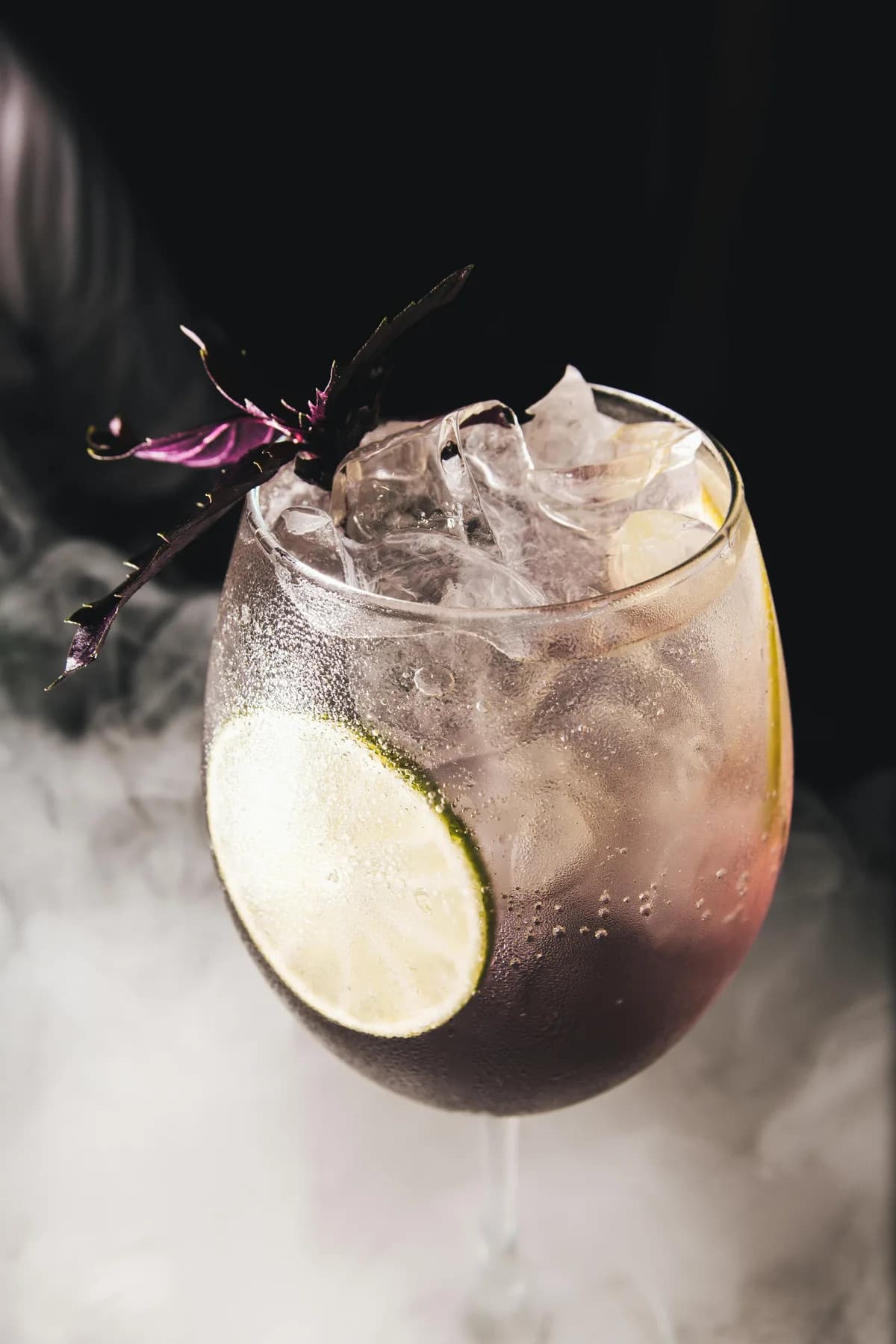 Commercial ice machine open for maintenance inspection in restaurant kitchen