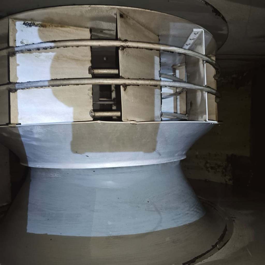 The same exhaust fan housing cleaned back to bare metal