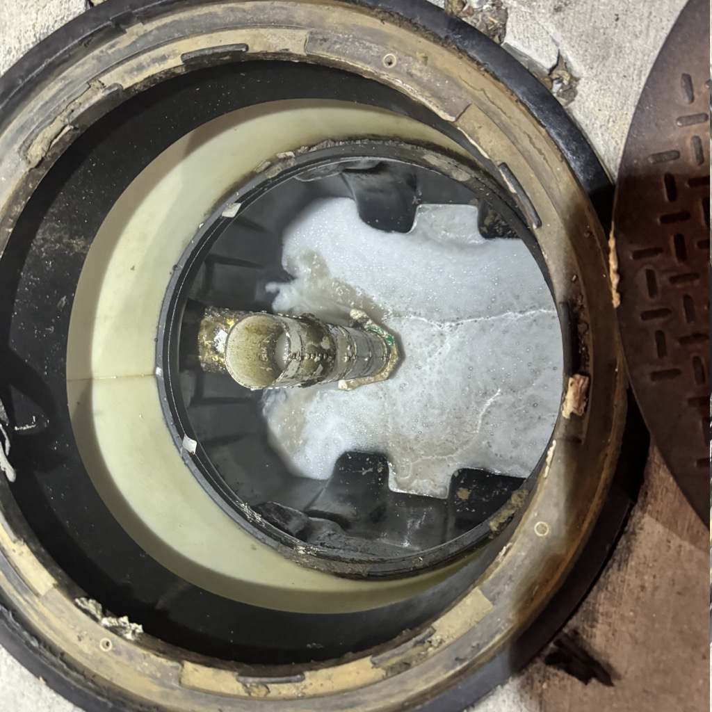 The same grease trap pumped out and rinsed clean